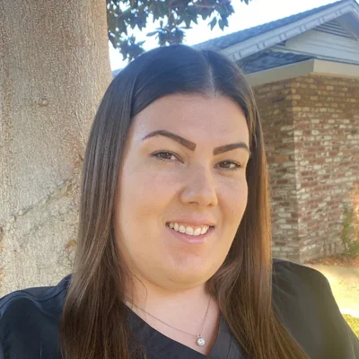 A headshot photo of Briana